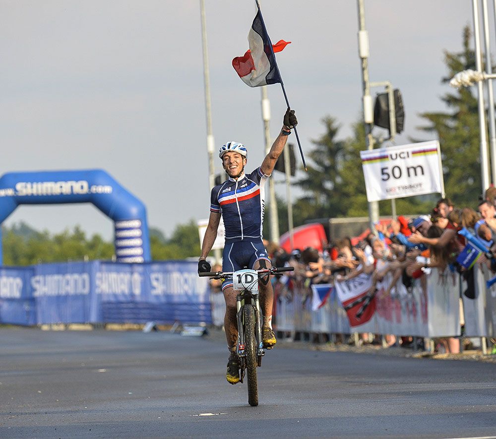 Jordan Sarrou celebrates the win by France