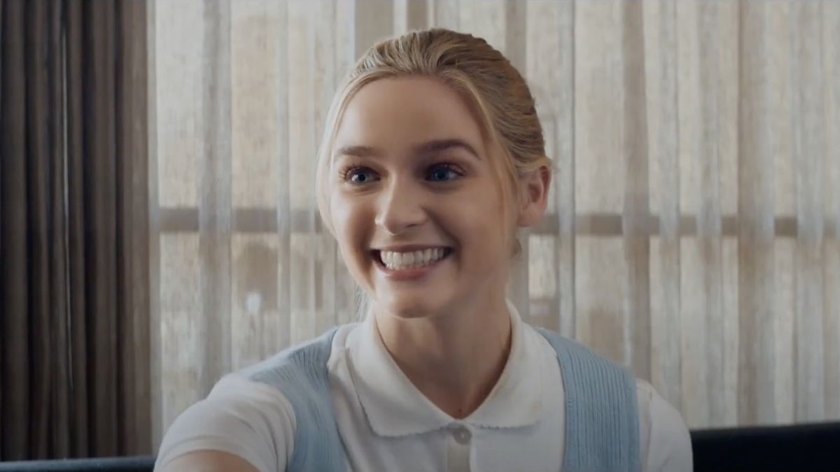 Greer Grammer smiling widely in Deadly Illusions