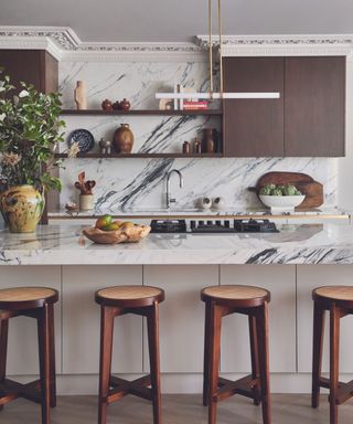Wooden and marble kitchen with statement marble splashback