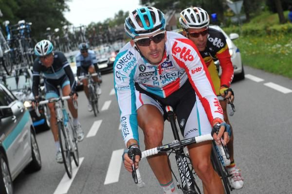 Omega Pharma-Lotto's Jelle Vanendert and Philppe Gilbert make their way back to the peloton.