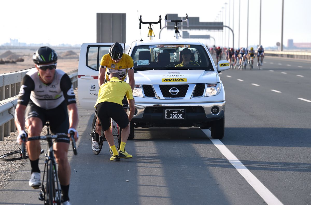 Edvald Boasson Hagen gets a new front wheel from the Mavic neutral service