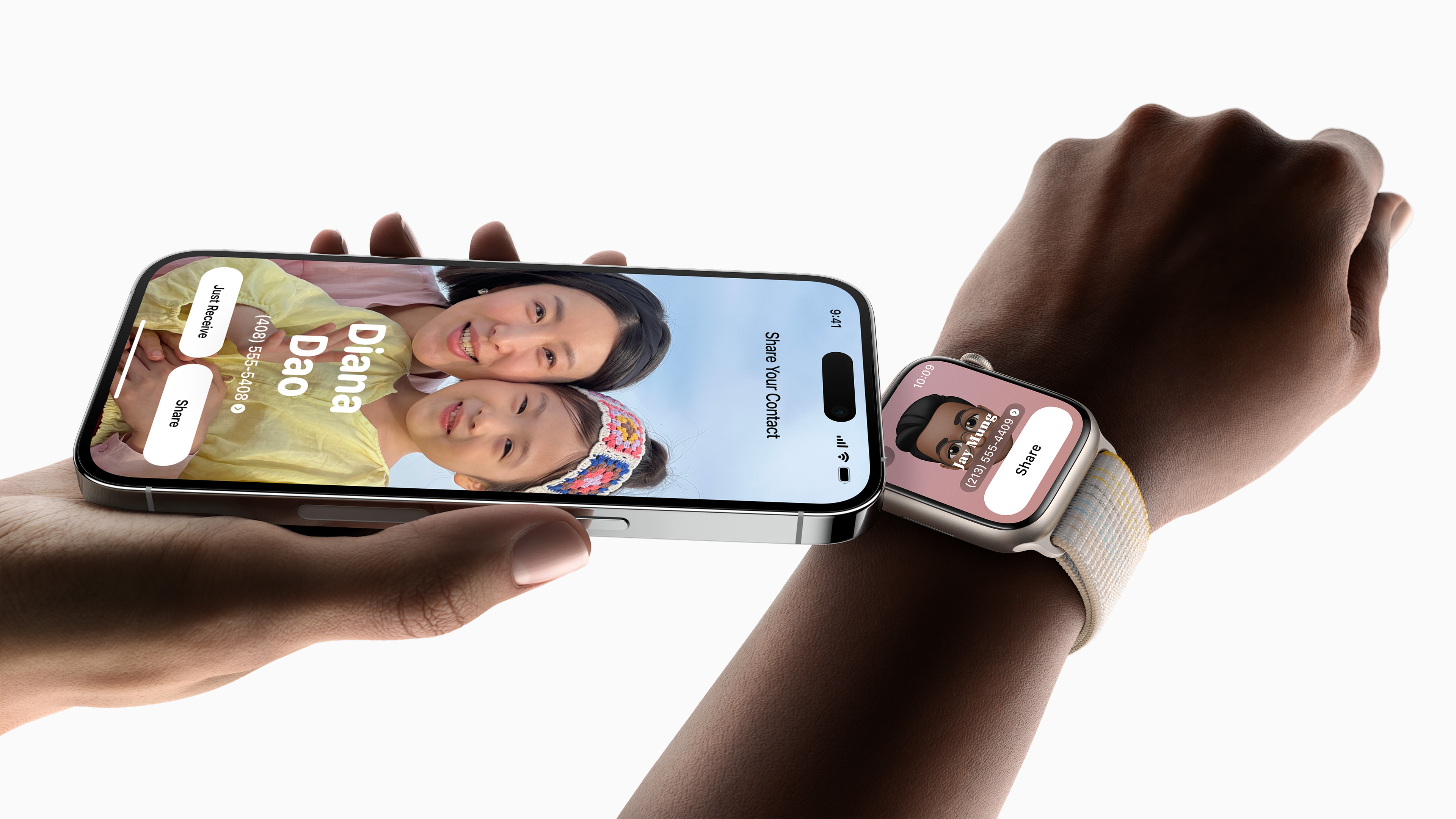 The Apple Watch on someone's wrist next to an iPhone in someone's hand.