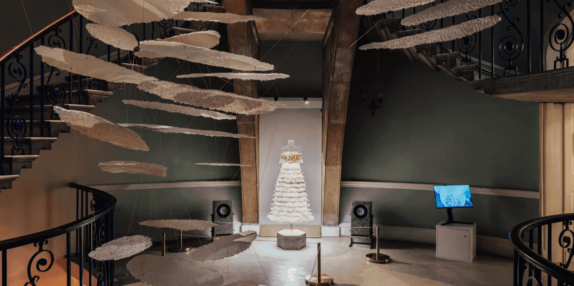 A series of design installations with a theatrical essence alternate in a gif.
