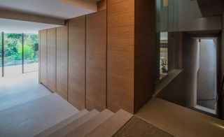 Oak panelling complements the Bolzano-sourced stone