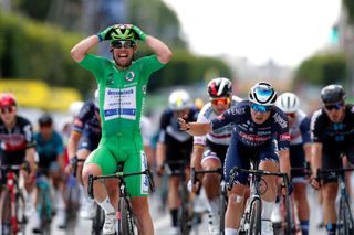 CHATEAUROUX FRANCE JULY 01 Mark Cavendish of The United Kingdom and Team Deceuninck QuickStep Green Points Jersey celebrates at arrival ahead of Jasper Philipsen of Belgium and Team AlpecinFenix during the 108th Tour de France 2021 Stage 6 a 1606km stage from Tours to Chteauroux LeTour TDF2021 on July 01 2021 in Chateauroux France Photo by Guillaume Horcajuelo PoolGetty Images