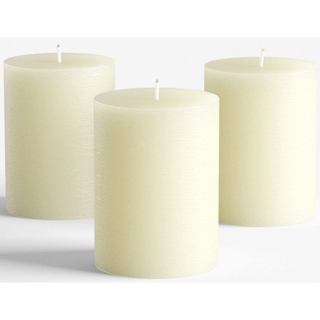 3 white pillar candles