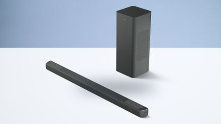 The Philips B8301 soundbar and subwoofer on a white surface with a blue background