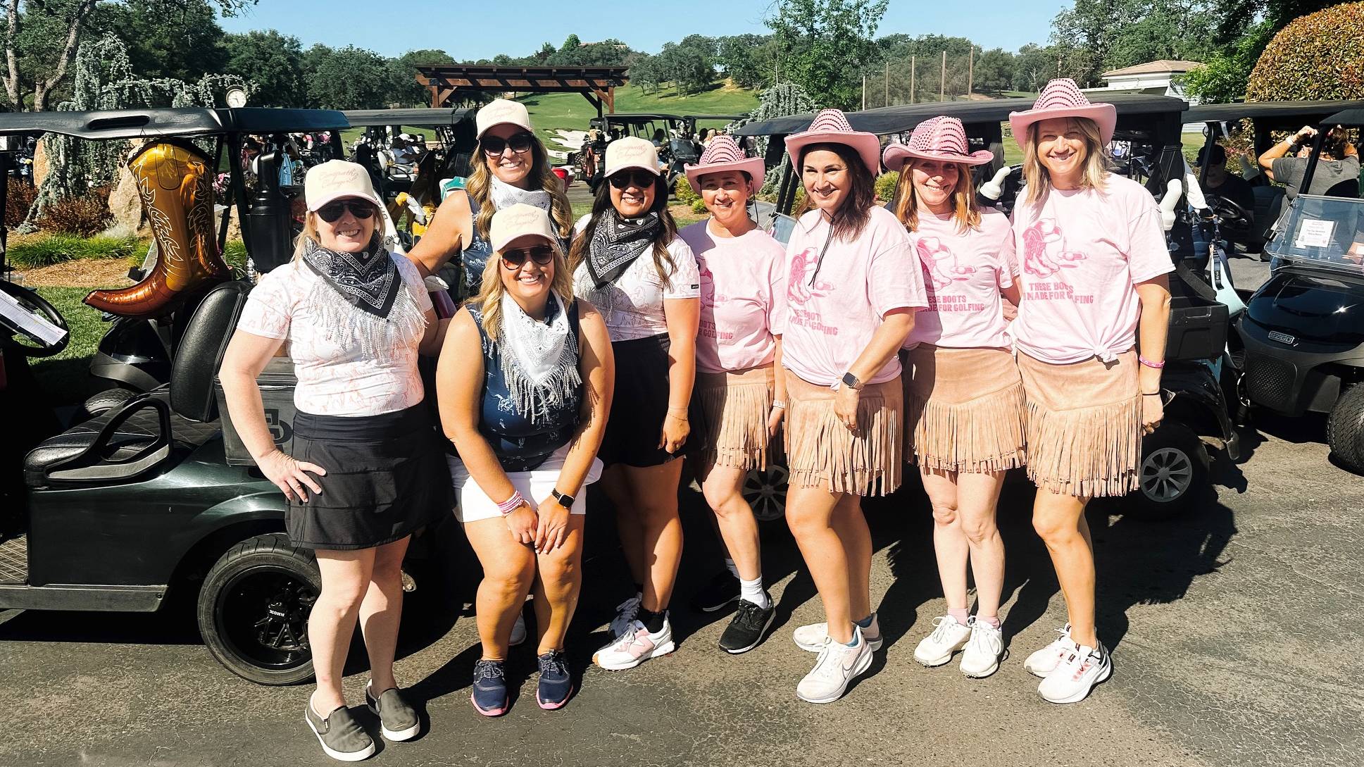 Group of female golfers dressed as cowgirls