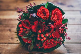 floral arrangement with red roses