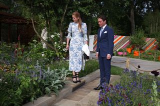 Princess Beatrice and her husband, Edoardo Mapelli Mozzi are given a tour during a visit to The Chelsea Flower Show 2022