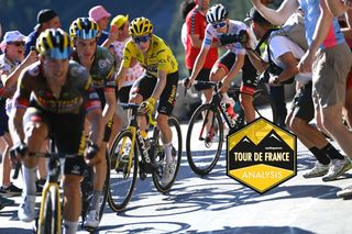 Primož Roglič leads the Jumbo-Visma team with Jonas Vingegaard in yellow on stage 14 to the top of the Alpe d'Huez