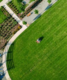 Aerial shot of mowing a lawn 