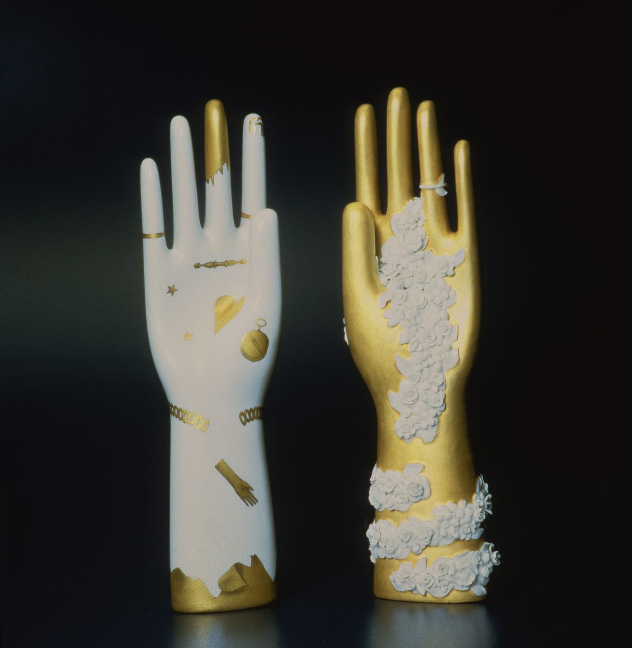 Hand with gold symbol