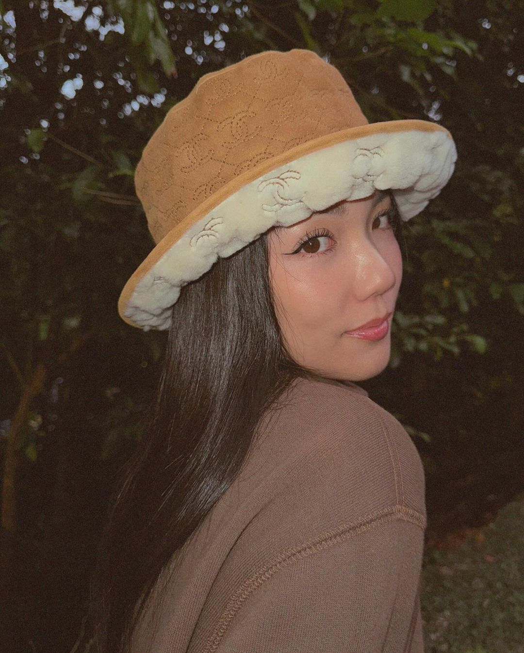 Yoyo Cao in a Chanel hat