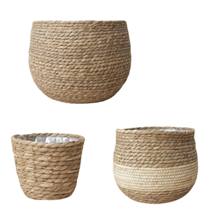 A set of three large planters made from natural seagrass fibres