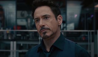 Avengers: Age of Ultron Tony pulls a concerned look in his lab