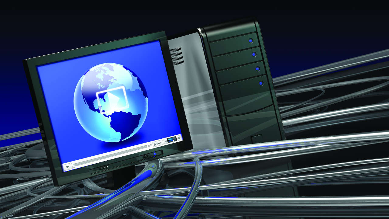 blue and white globe of the Earth is displayed on a monitor