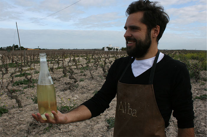 Fernando Angula, of Alba, serving Campeonisimo wine.