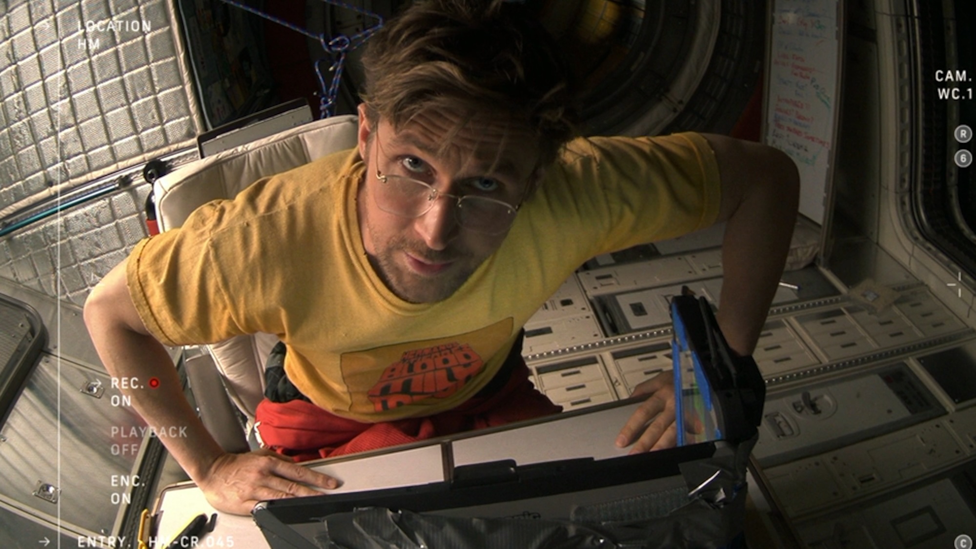 Ryan Gosling looking up at the camera in Project Hail Mary