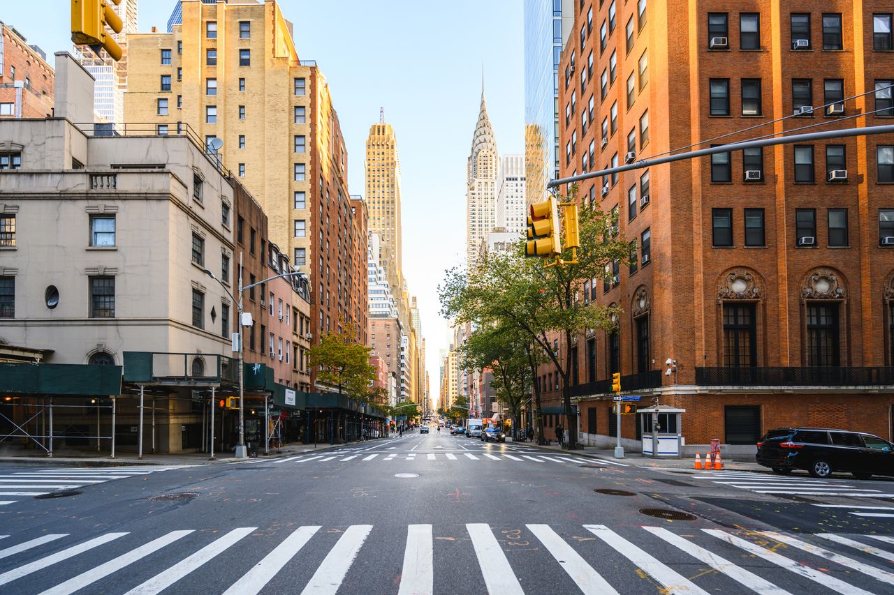 A New York City street in the sunshine.