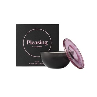 Closeness Candle in black and pink packaging