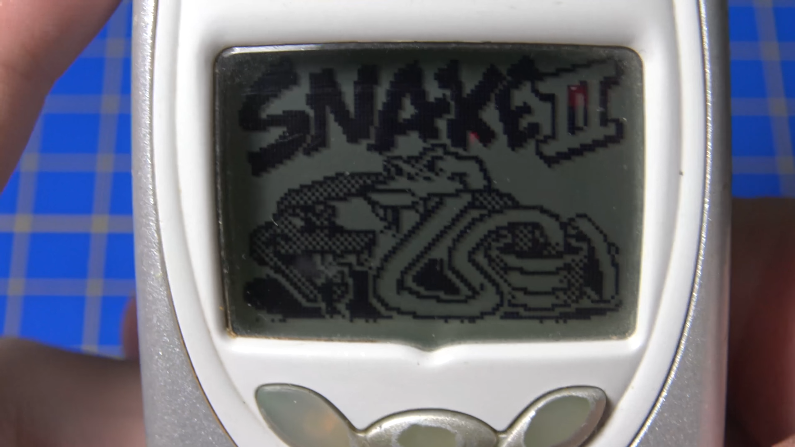 Nokia 3310 running snake with title screen displayed