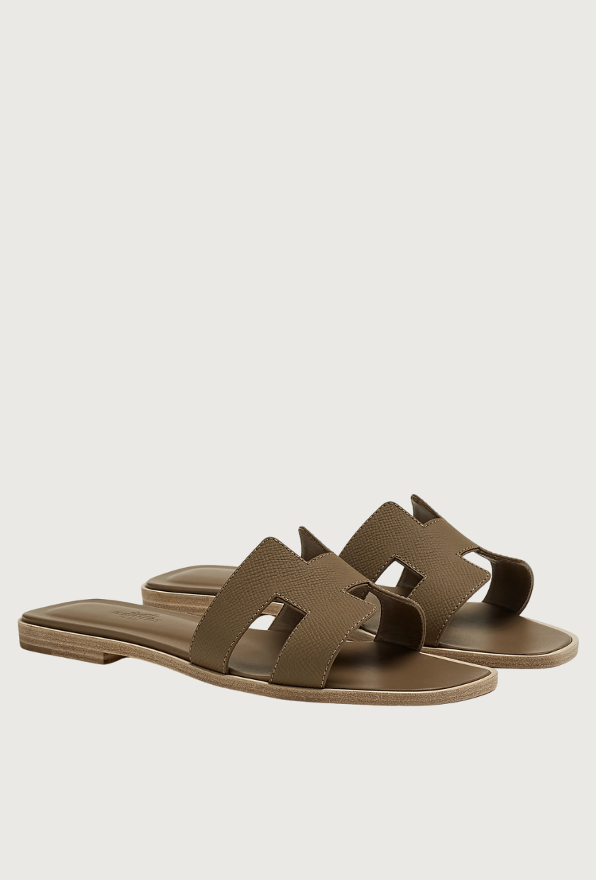 An image of Herm&amp;egrave;s Oran sandals, one of the most iconic shoes. 