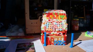 This delicious gingerbread house is build on top of a 3D-printed scaffolding, shown here at World Maker Faire on Sept. 22, 2013.