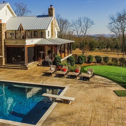 exterior of house with garden and swimming pool