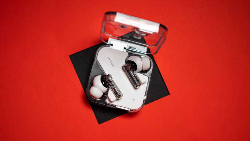 Nothing Ear (2) earbuds review on red background