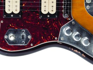 Among the modifications are a second volume control and a three-position toggle switch.