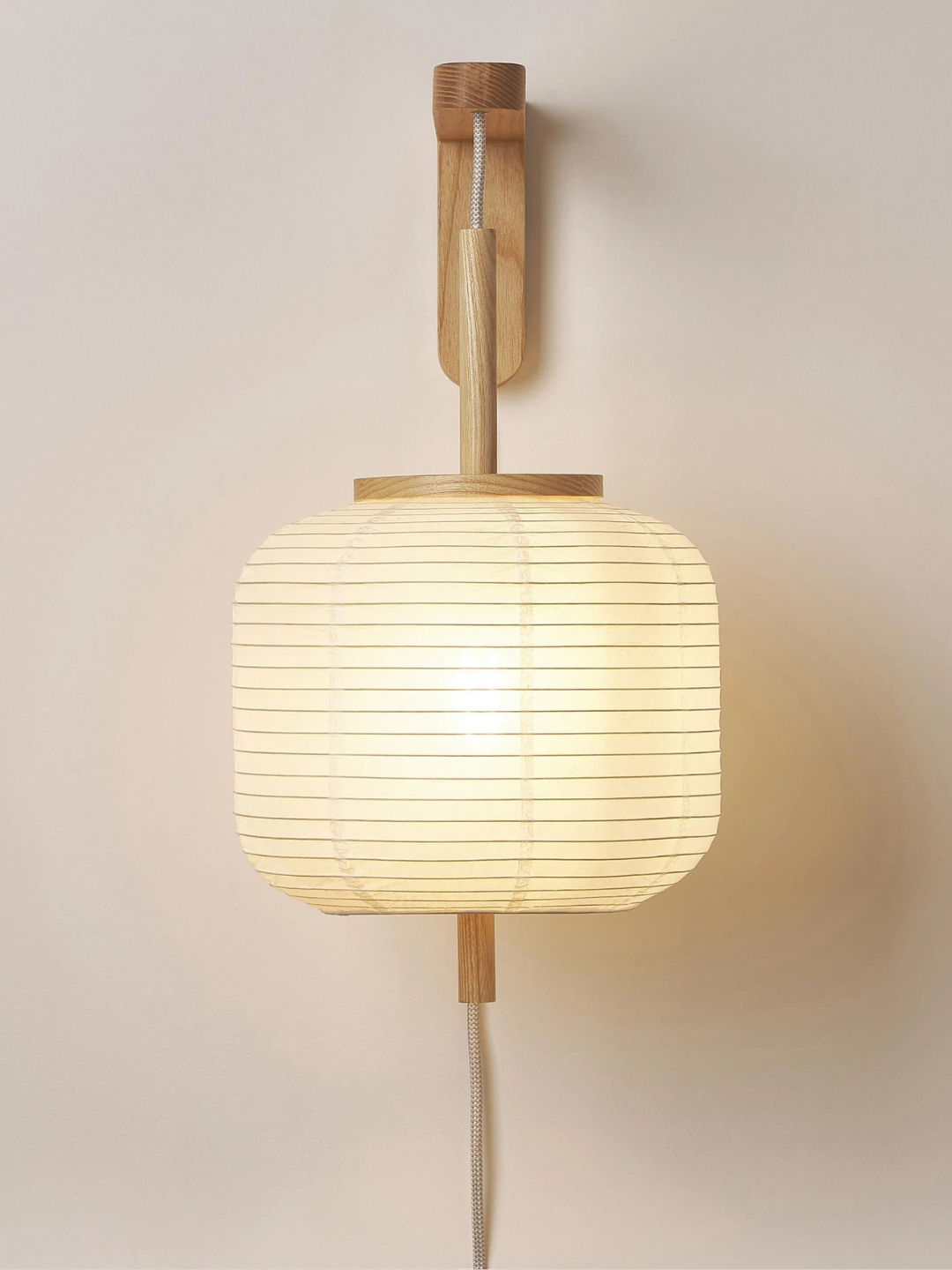 A hanging rice paper wall lamp from Westwing
