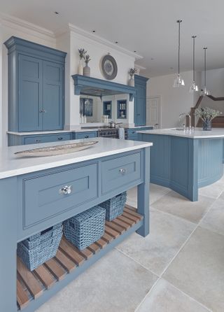 Blue kitchen with double island