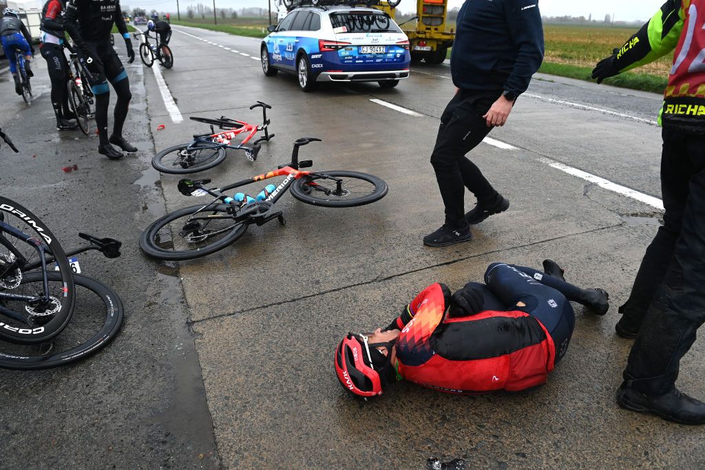 WEVELGEM BELGIUM MARCH 26 Micha Kwiatkowski of Poland and Team INEOS Grenadiers after being involved in a crash during the 85th GentWevelgem in Flanders Fields 2023 Mens Elite a 2609km one day race from Ypres to Wevelgem UCIWT on March 26 2023 in Wevelgem Belgium Photo by Tim de WaeleGetty Images