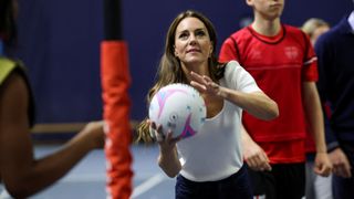 Catherine, Princess of Wales plays netball as she takes part in a mental fitness workshop run by SportsAid