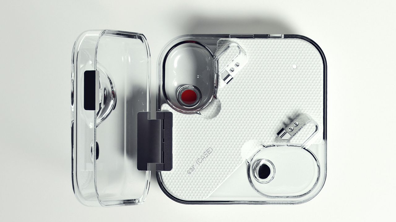 Top-down view of the transparent Nothing Ear 1 charging case with the lid open