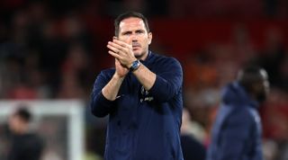 Chelsea caretaker manager Frank Lampard applauds the fans after the Premier League match between Manchester United and Chelsea at Old Trafford on May 25, 2023 in Manchester, England.