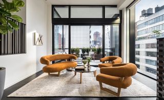Getty apartment interiors with orange armchairs