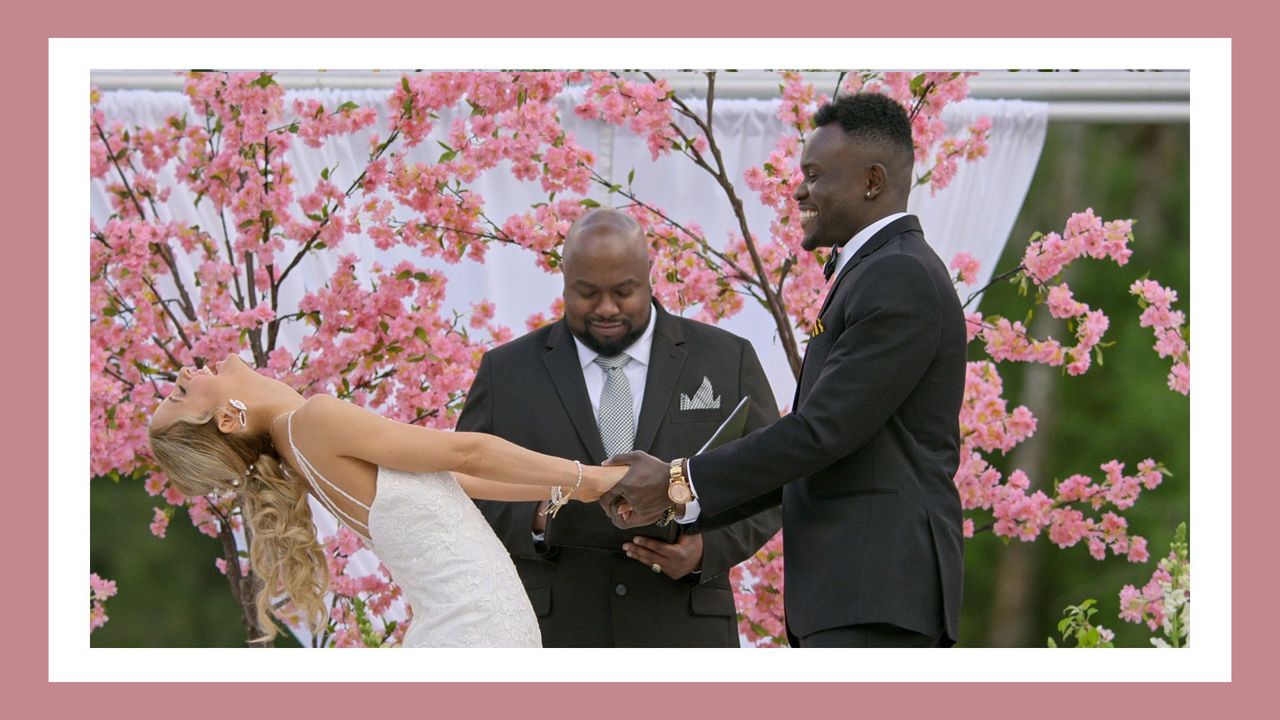 Kwame and Chelsea Love Is Blind wedding day in front of cherry blossoms