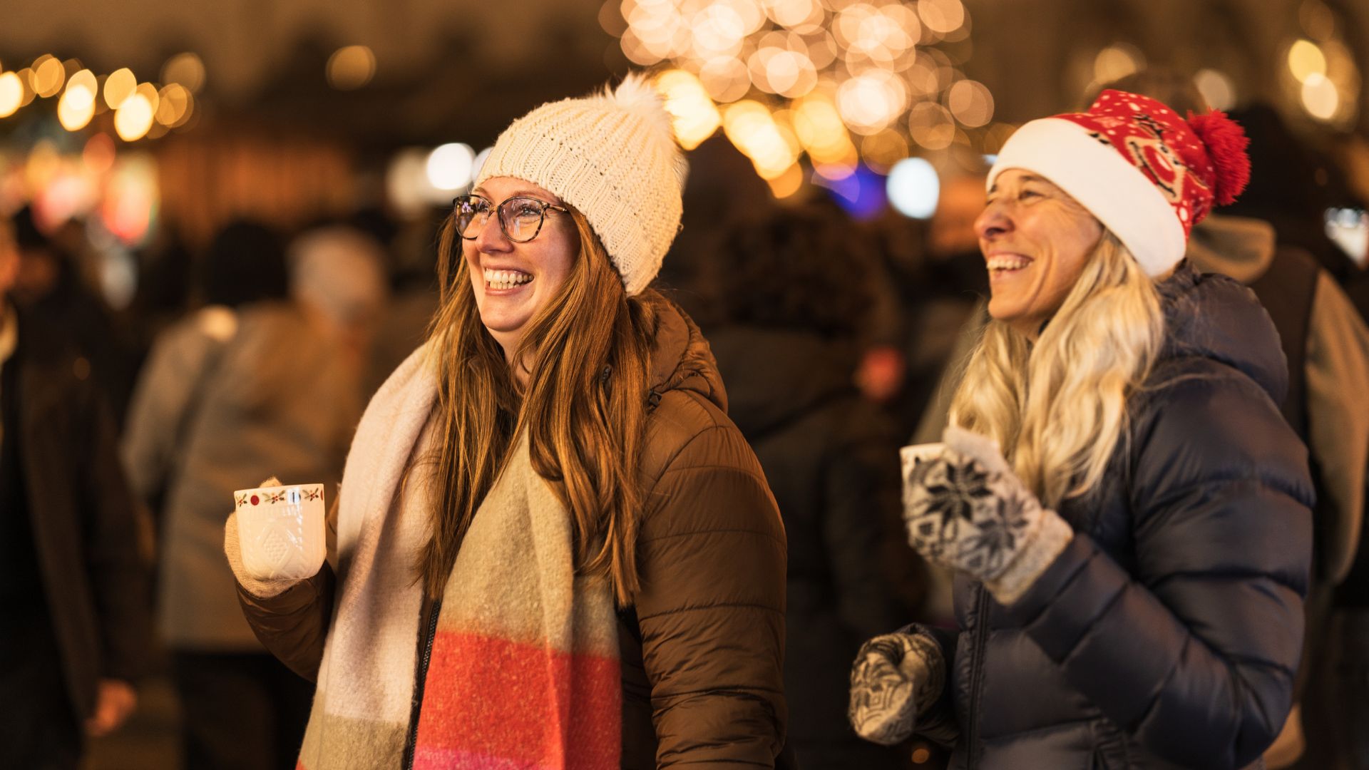 Two women at Christmas market