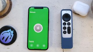 an iPhone with FindMy turned on and the Elago R5 apple tv remote case and Siri Remote