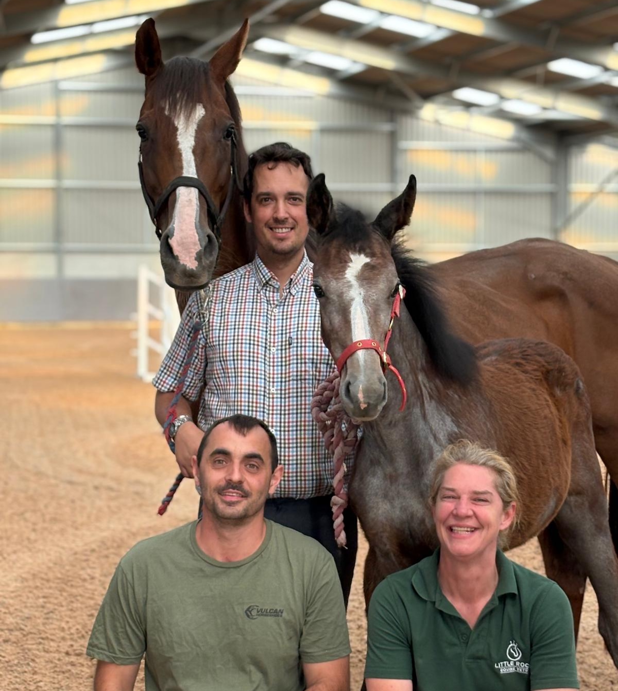 Owner Nick holding Penelope and her foster mother with vet Shelley and farrier Tracy in front