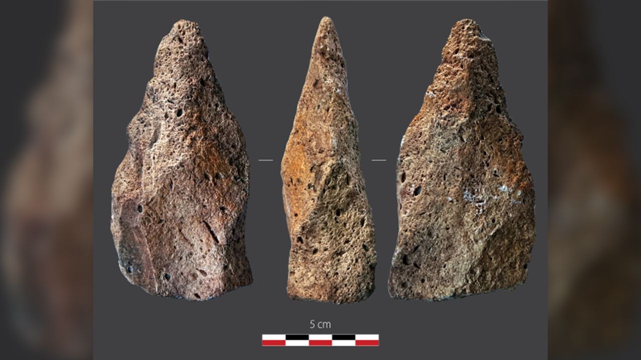 Three views of a stone artifact.