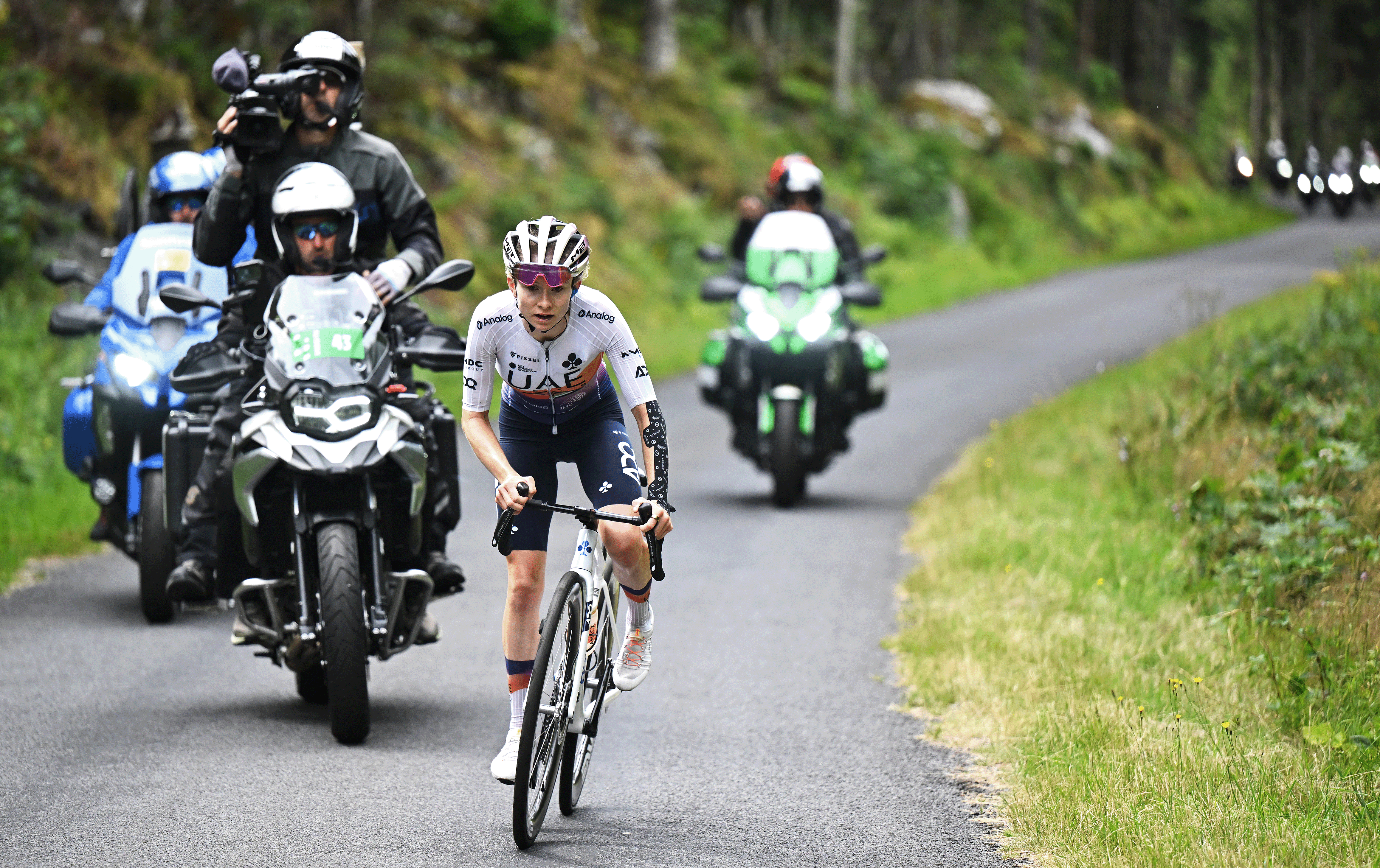 AMBERT, FRANCE - JULY 31: Maeva Squiban of France and UAE Team ADQ attacks during the 4th Tour de France Femmes 2025, Stage 6 /a 123.7km stage from Clermont-Ferrand to Ambert #UCIWWT / on July 31, 2025 in Ambert, France. (Photo by Szymon Gruchalski/Getty Images)