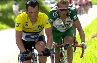 Lance Armstrong in yellow leads Christophe Moreau back at the 2002 Dauphine
