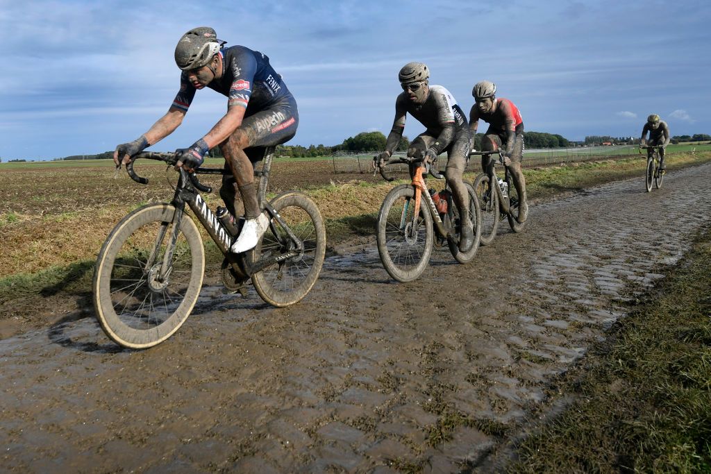 Dutch Mathieu van der Poel of AlpecinFenix Italian Sonny Colbrelli of Bahrain Victorious and Canadian Guillaume Boivin of Israel StartUp Nation pictured in action during the men elite race of the ParisRoubaix cycling event 2577km from Compiegne to Roubaix France on Sunday 03 October 2021 BELGA PHOTO DAVID STOCKMAN Photo by DAVID STOCKMANBELGA MAGAFP via Getty Images