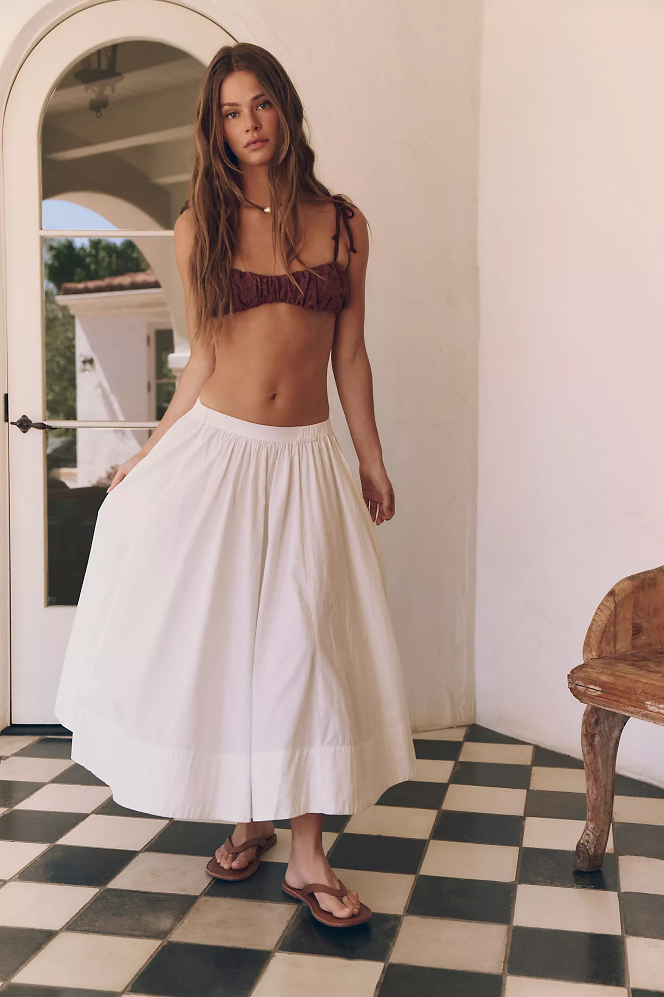 A-line skirt with pull on design. Fit with soft pleating and side pockets.