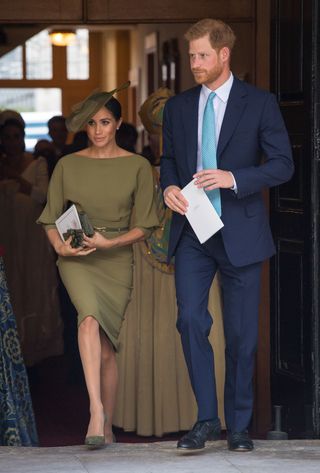 Prince Harry and Meghan Markle at Prince Louis' christening in 2018