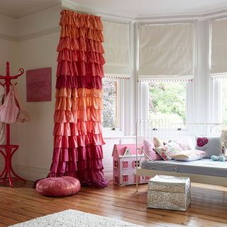 girls bedroom with shower curtain and day bed