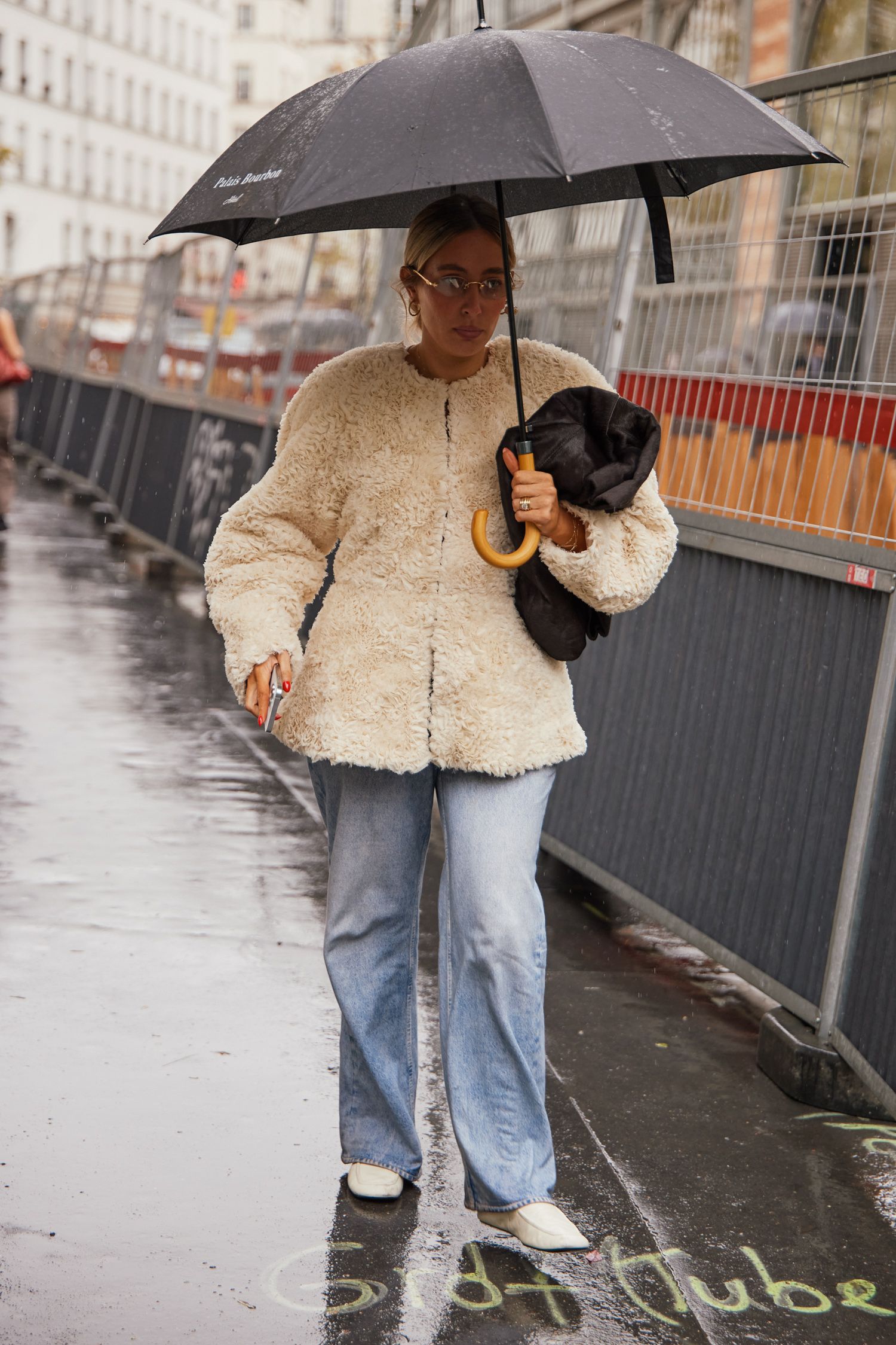 A Paris Fashion Week attendee shows off their outfit.